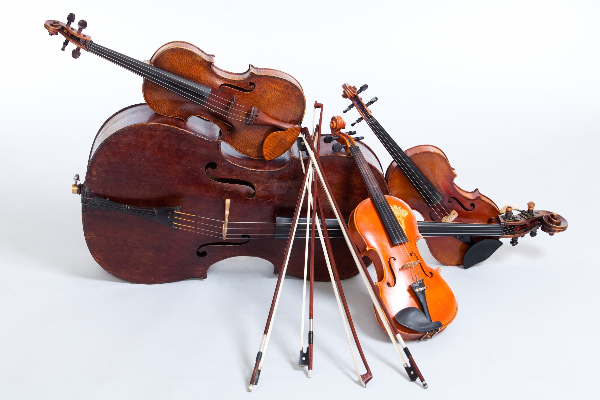 Image of string instruments resting against each other
